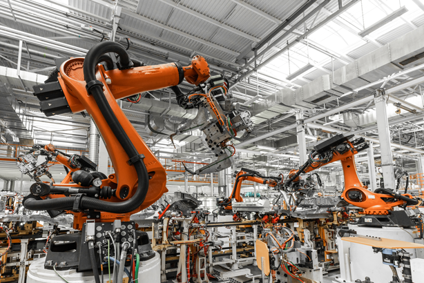 robots col·laboratius treballant a la industria